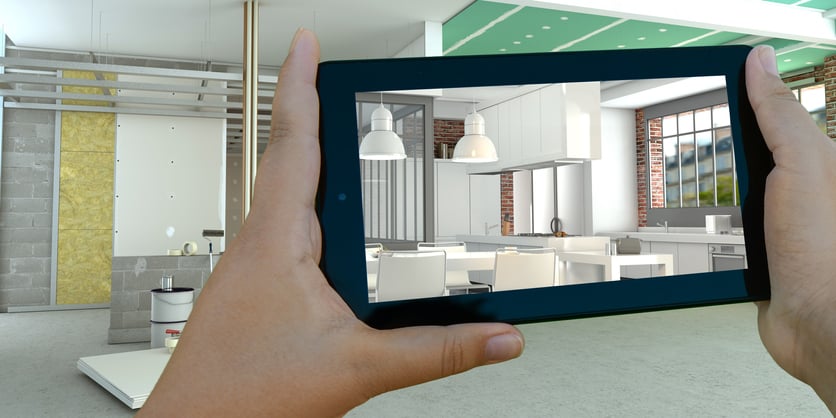 A room's final design is visualized utilizing BIM software on an iPad