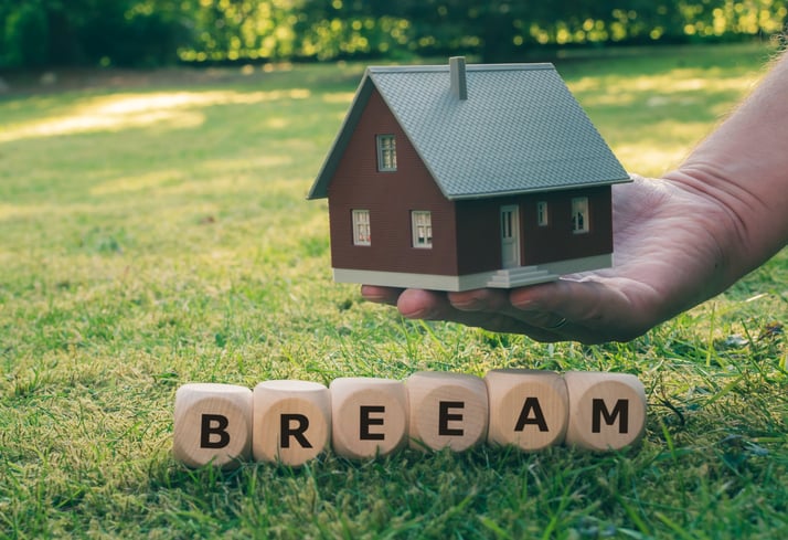BREEAM-letters-next-to-hand-holding-toy-house