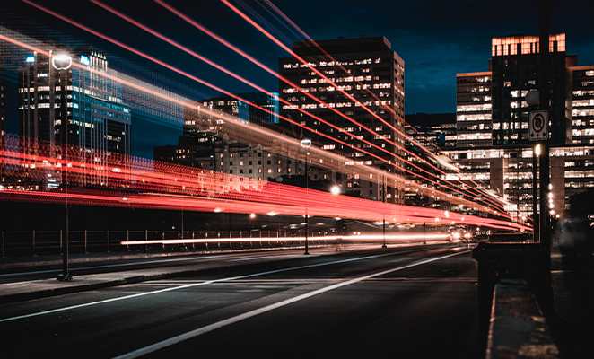 A hyper-fast city lit up at night