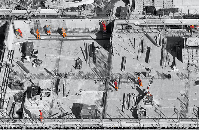 Aerial view of construction workers on jobsite