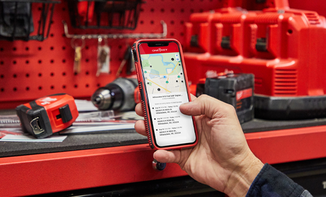 A tool room manager operates One-Key inventory management app on smartphone to review tool location history