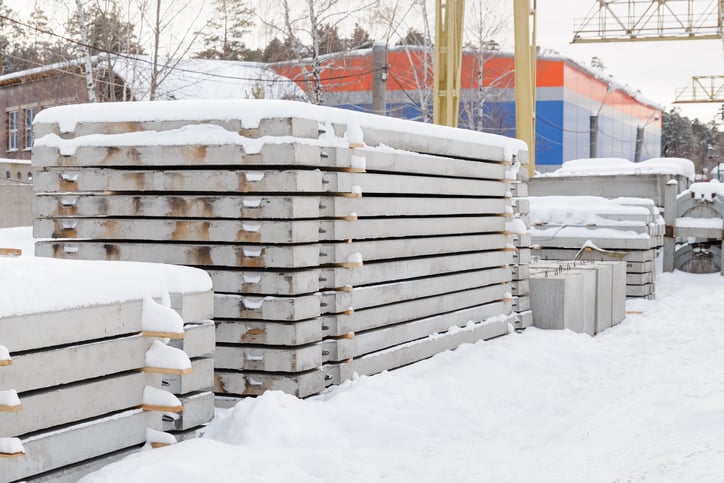 Precast concrete slabs coated in snow