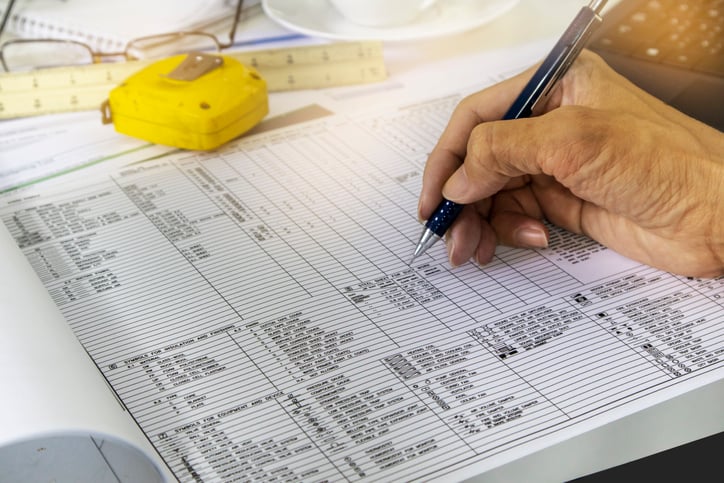 Project engineers check the construction documents of various systems