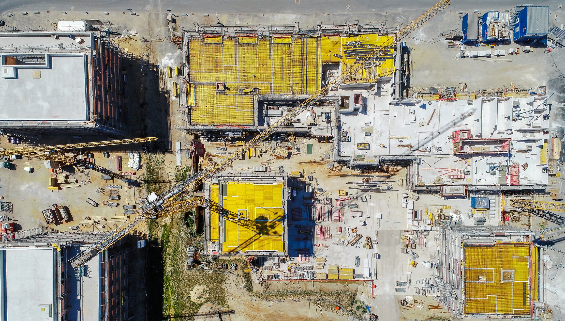 An arial shot of a construction site taken from a drone from overhead