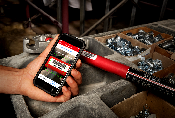 smartphone camera scans barcode on a hand tool